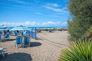 On the beach, white sand