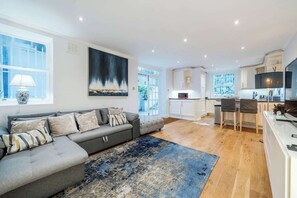 TV, offices - Beautifully renovated 2-bedroom, 2-bathroom garden apartment in the heart of Kensington & Chelsea, featuring a spacious king en-suite, flexible bedding, bright living areas, and elegant finishes — perfect for families, friends, or business stays. (Greater London)