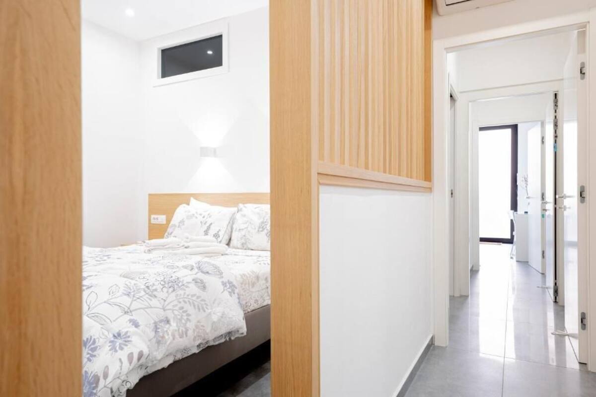 Deluxe Apartment, 2 Bedrooms, Patio, Courtyard View | Blackout curtains, iron/ironing board, free WiFi