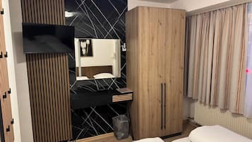 Chambre avec lits jumeaux, vue ville | Fer et planche Ă repasser, Wi-Fi gratuit