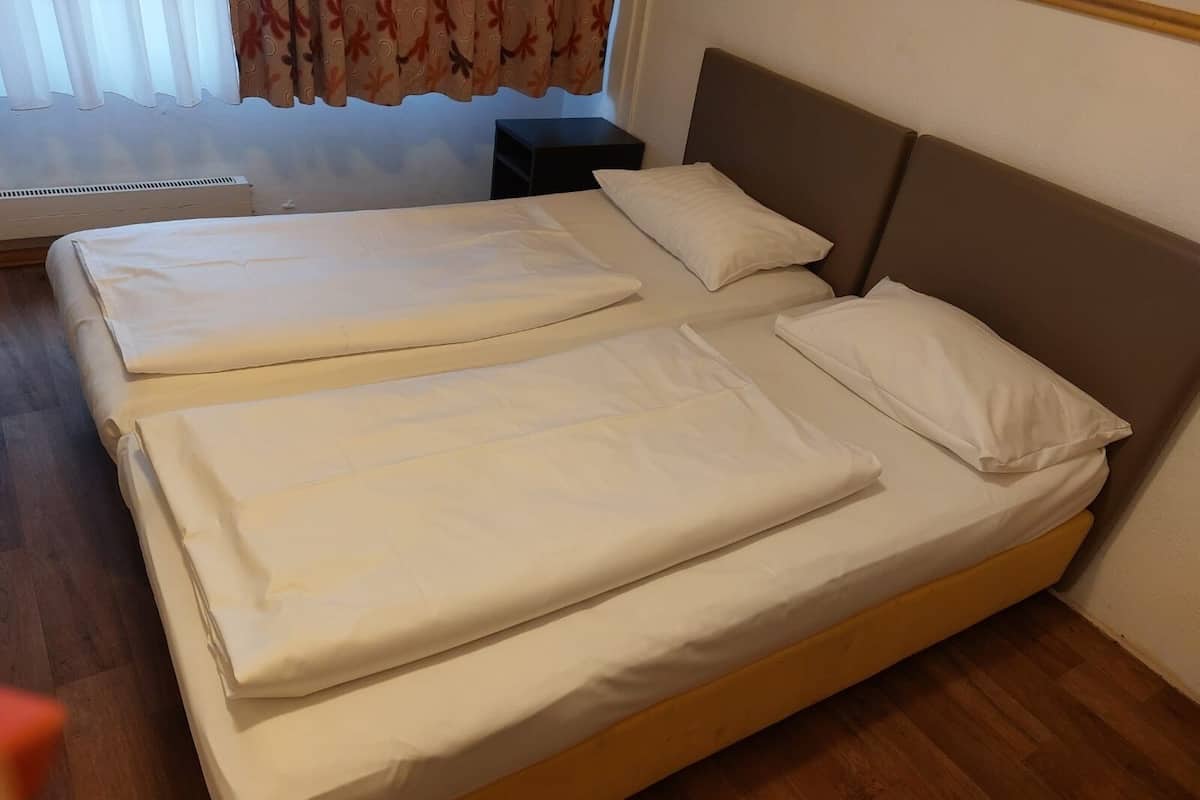 Quadruple Room, City View | Iron/ironing board, free WiFi
