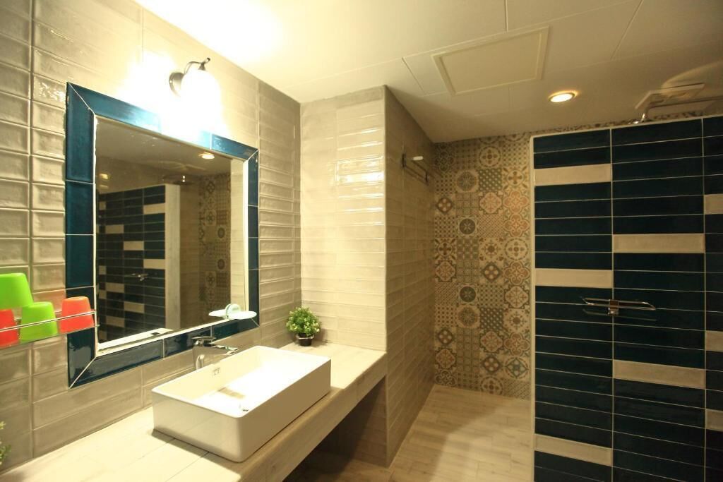 Deluxe Quadruple Room, Balcony, Mountain View | Bathroom | Rainfall showerhead, hair dryer, slippers, towels