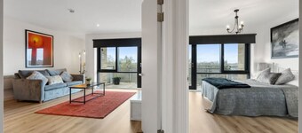 Cosy Flat with River-view balcony, free secure parking, and city centre location