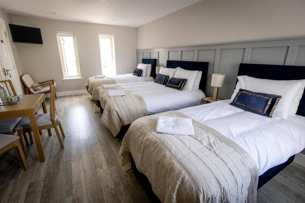 Family Room, Garden View | Blackout drapes, soundproofing, iron/ironing board, free WiFi