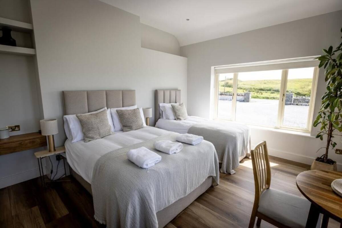 Classic Triple Room, Sea View | Blackout drapes, soundproofing, iron/ironing board, free WiFi