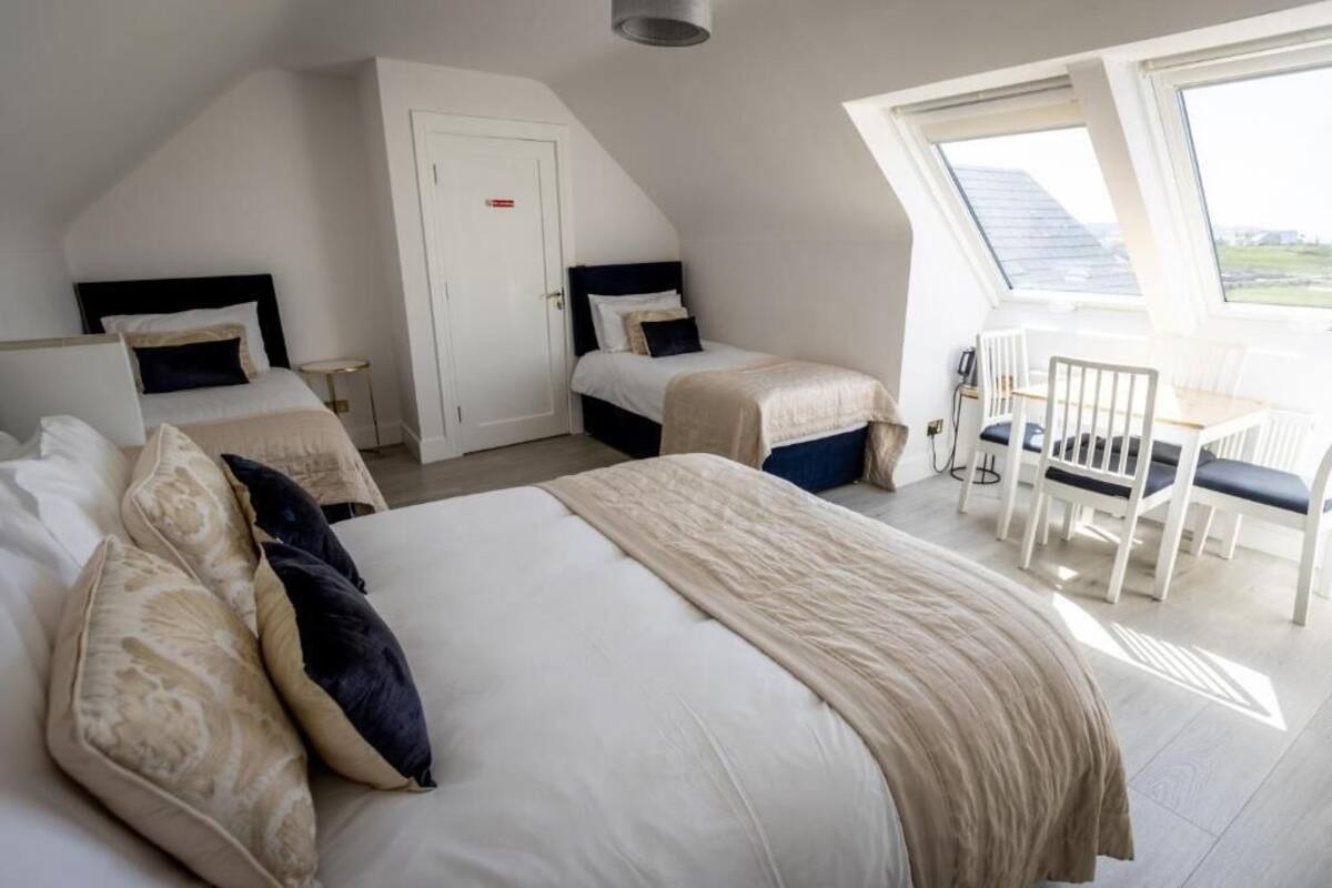 Family Room, Sea View | Blackout drapes, soundproofing, iron/ironing board, free WiFi