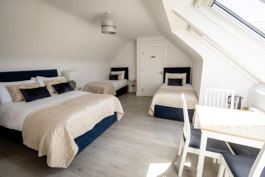 Family Room, Sea View | Blackout drapes, soundproofing, iron/ironing board, free WiFi