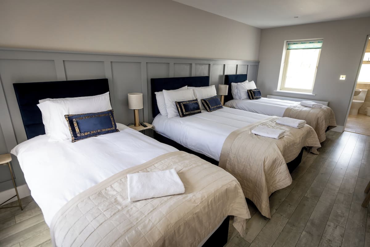 Family Room, Garden View | Blackout drapes, soundproofing, iron/ironing board, free WiFi