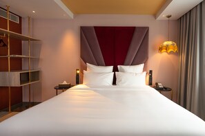 Hypo-allergenic bedding, minibar, in-room safe, individually decorated