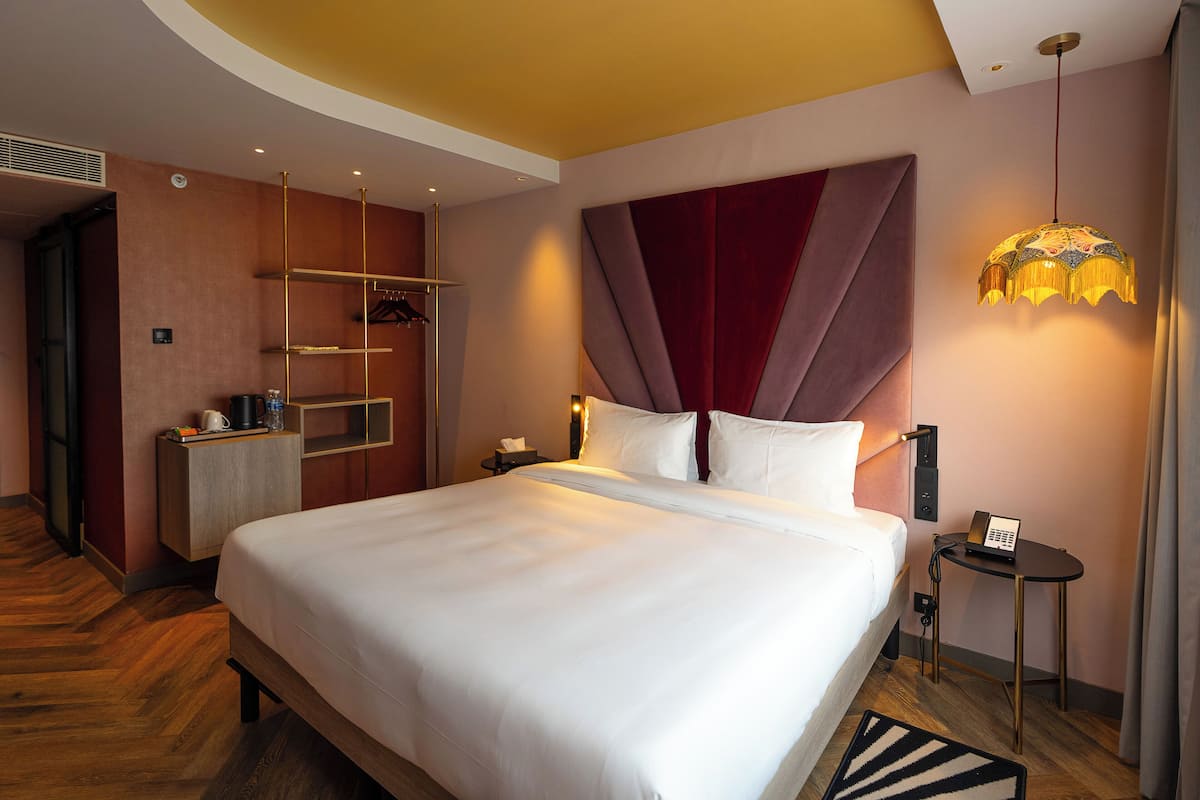 Hypo-allergenic bedding, minibar, in-room safe, individually decorated