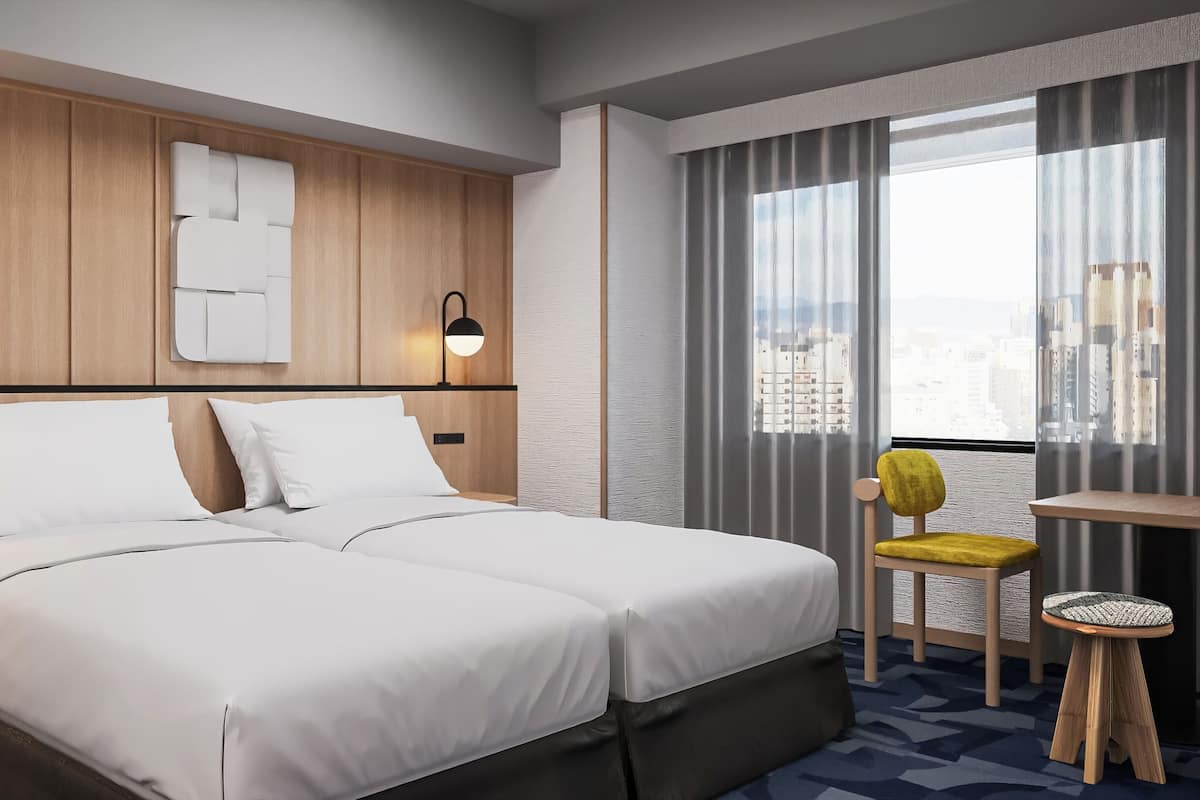 Deluxe Twin Room, 2 Single Beds | In-room safe, free WiFi, bed sheets