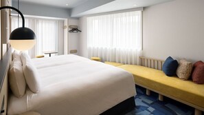 Kahden hengen deluxe-huone (kaksi sänkyä), 2 yhden hengen sänkyä | Tallelokero huoneessa, ilmainen Wi-Fi, vuodevaatteet