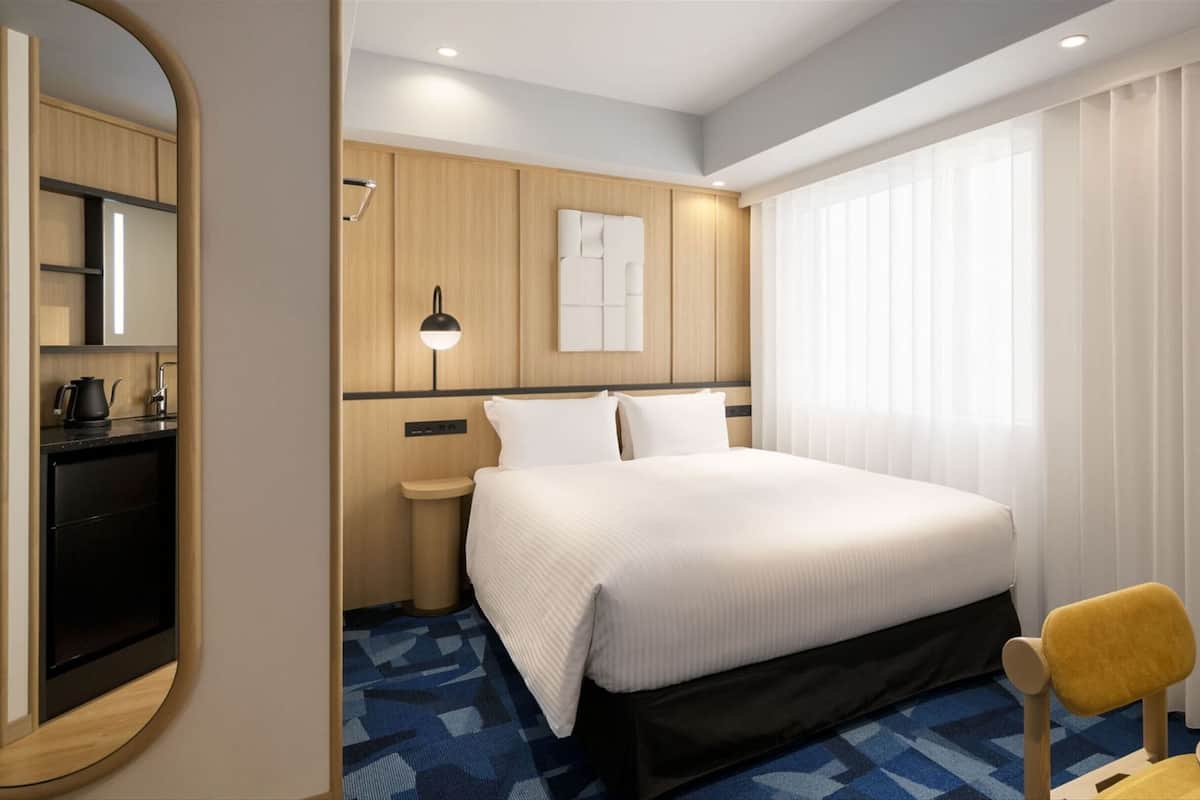 Comfort-huone, 1 keskisuuri parisänky | Tallelokero huoneessa, ilmainen Wi-Fi, vuodevaatteet