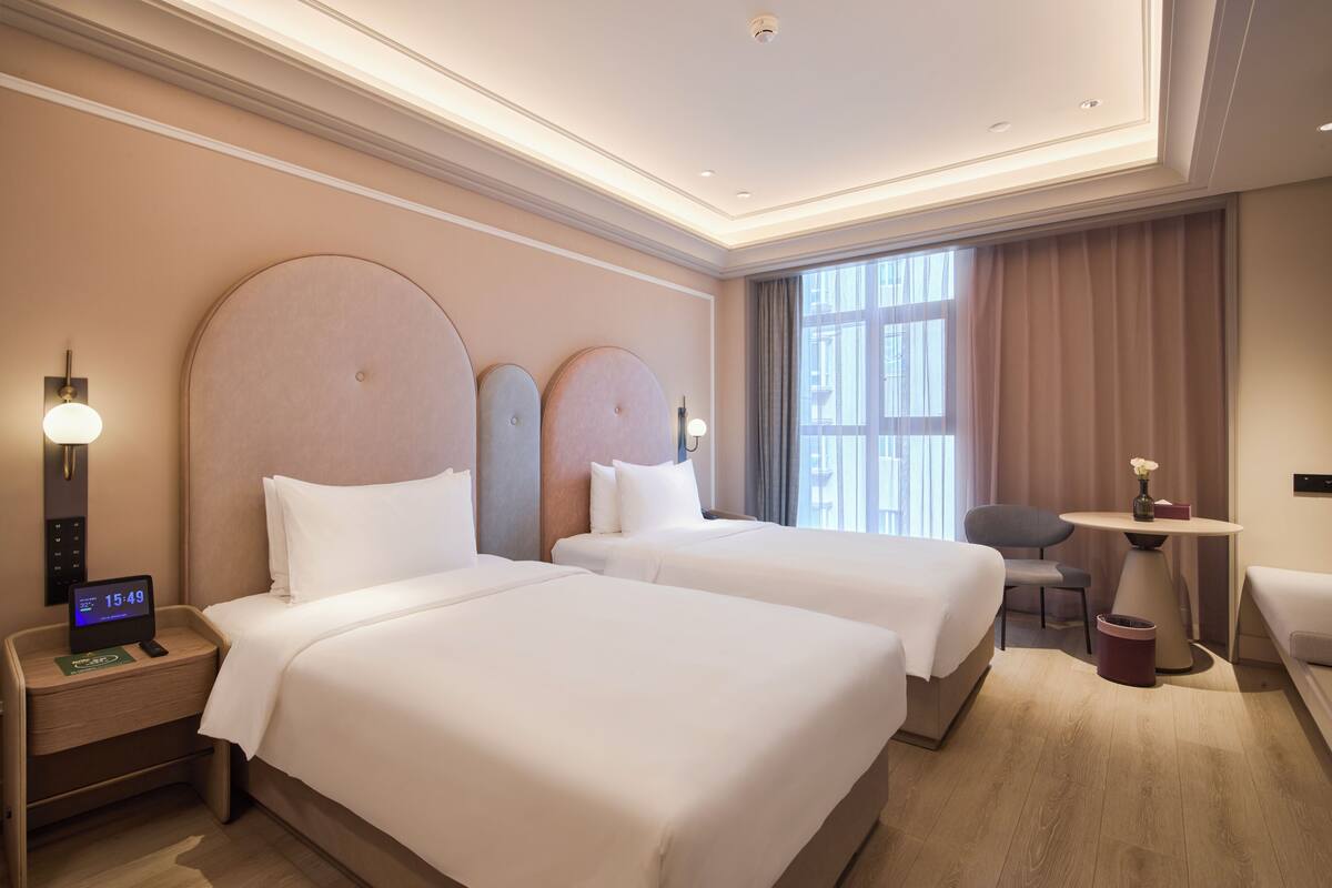 ห้องดีลักซ์, เตียงเดี่ยว 2 เตียง | เครื่องนอนระดับพรีเมียม, มินิบาร์ฟรี, ห้องเก็บเสียง, Wi-Fi ฟรี