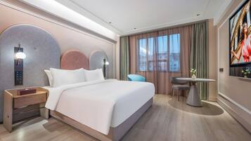 Premium bedding, down duvets, pillow-top beds, free minibar