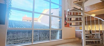 Renovated workshop in the heart of a village, close to the Volcans d'Auvergne!