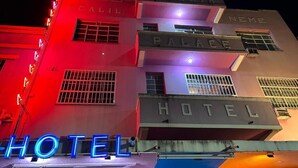 A hotel with signage indicating "HOTEL," "GOIANIA," "PALACE," and "NEME." - Goiânia Palace Hotel (Goiânia)