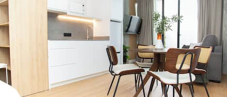 The 153 Hotel Loft 4 | Private kitchen | Full-size fridge, microwave, stovetop, toaster