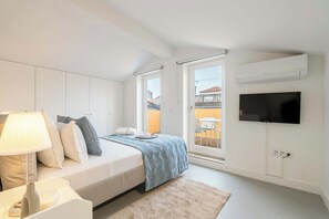 1 habitación, tabla de planchar con plancha, cuna de viaje y internet 