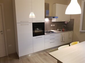 Private kitchen - La Conquilla Double room (Alghero)