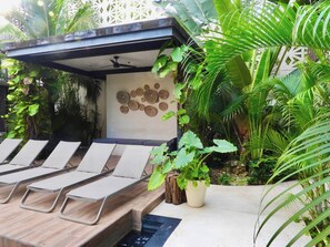 Terrace/patio - Welcome to the garden in Tulum — a chic, art-forward studio in the heart of Tulum combining style, comfort, and convenience. Enjoy your own private space with a king-size bed, fully equipped kitchen, smart TV, and AC. (Tulum)