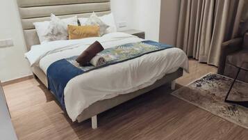 Luxury Apartment, City View | Laptop workspace, iron/ironing board, free WiFi