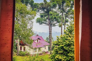Quarto luxo, sacada, vista para o jardim | Vista do quarto