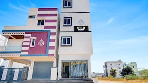 A modern hotel with a multi-story design, featuring a prominent 'HOTELO' sign on the facade. - Hotel O Snist University Hyderabad (Hyderabad)