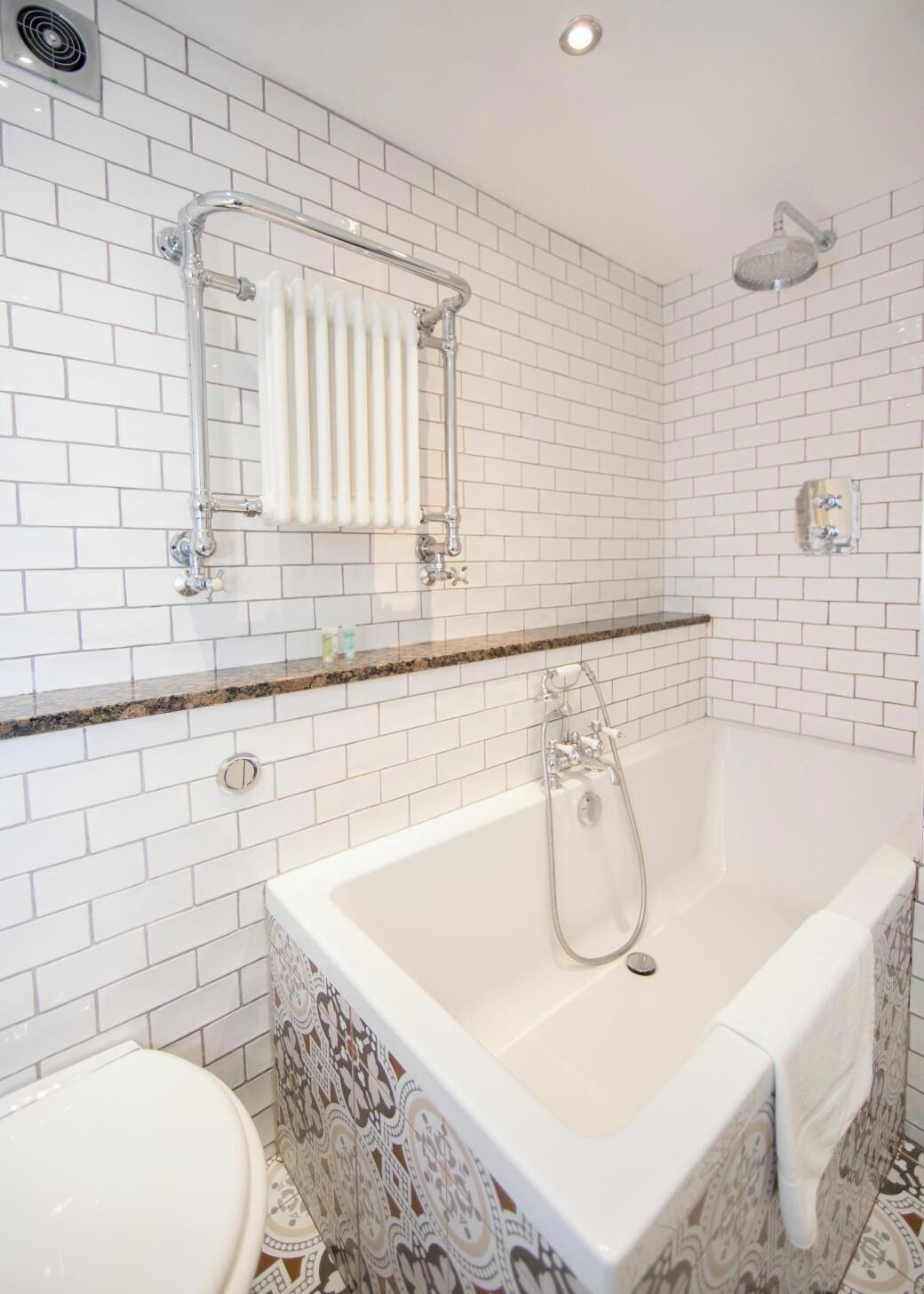 Shower, hair dryer, towels, shampoo