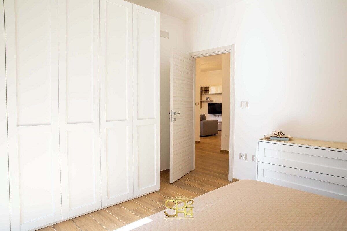 2 slaapkamers, een strijkplank/strijkijzer, gratis wifi, beddengoed