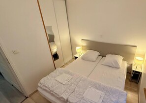 2 habitaciones, tabla de planchar con plancha y wifi gratis 