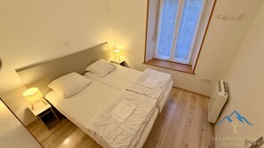 2 dormitorios, tabla de planchar con plancha, wifi gratis