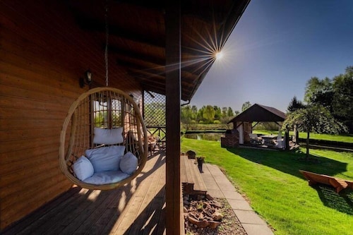 Holiday home with private pond, jacuzzi and sauna