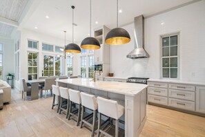 Fridge, microwave, oven, stovetop - Stylish Laid-Back Escape: Community Pool, 6 Bikes, & Spacious 3 Story Layout (Seagrove Beach)