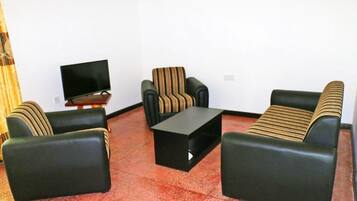 Doppelzimmer, Balkon, Gartenblick | Wohnbereich