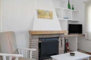 TV, fireplace - Rural House 'Casas Pepe 1' with Private Terrace, Wi-Fi and Air Conditioning (Los Caños de Meca)