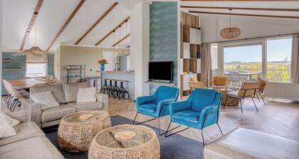 Geräumige, freistehende Familien-Strandvilla mit Dachterrasse und großem Garten. Fantastische Lage am Rande der Oosterschelde.