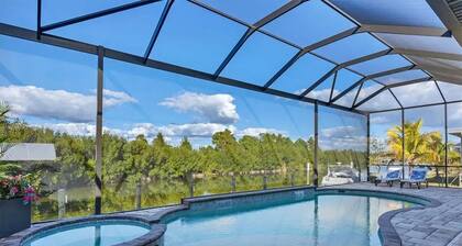 Waterfront private Resort style in South Gulf Cove, heated pool, spa & boat dock