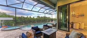 Waterfront private Resort style in South Gulf Cove, heated pool, spa & boat dock