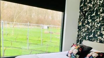 Deluxe-Doppelzimmer, Gartenblick | Bügeleisen/Bügelbrett, kostenloses WLAN