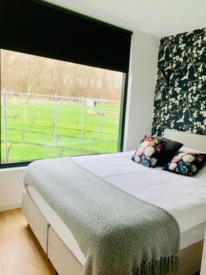 Deluxe-Doppelzimmer, Gartenblick | Bügeleisen/Bügelbrett, kostenloses WLAN