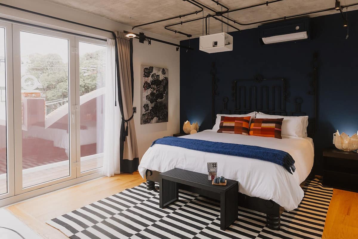 Design Studio Suite, 1 King Bed, City View | Premium bedding, down comforters, in-room safe, laptop workspace