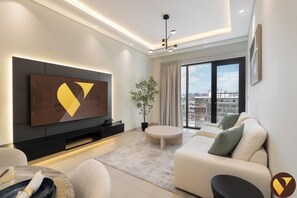 65-inch Smart TV with cable channels - Vogue | Al Serh Residences Near Circle Mall JVC (Dubai)
