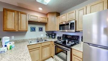 Condo, 1 Queen Bed with Sofa bed (Grand Caribbean West 310) | Private kitchen