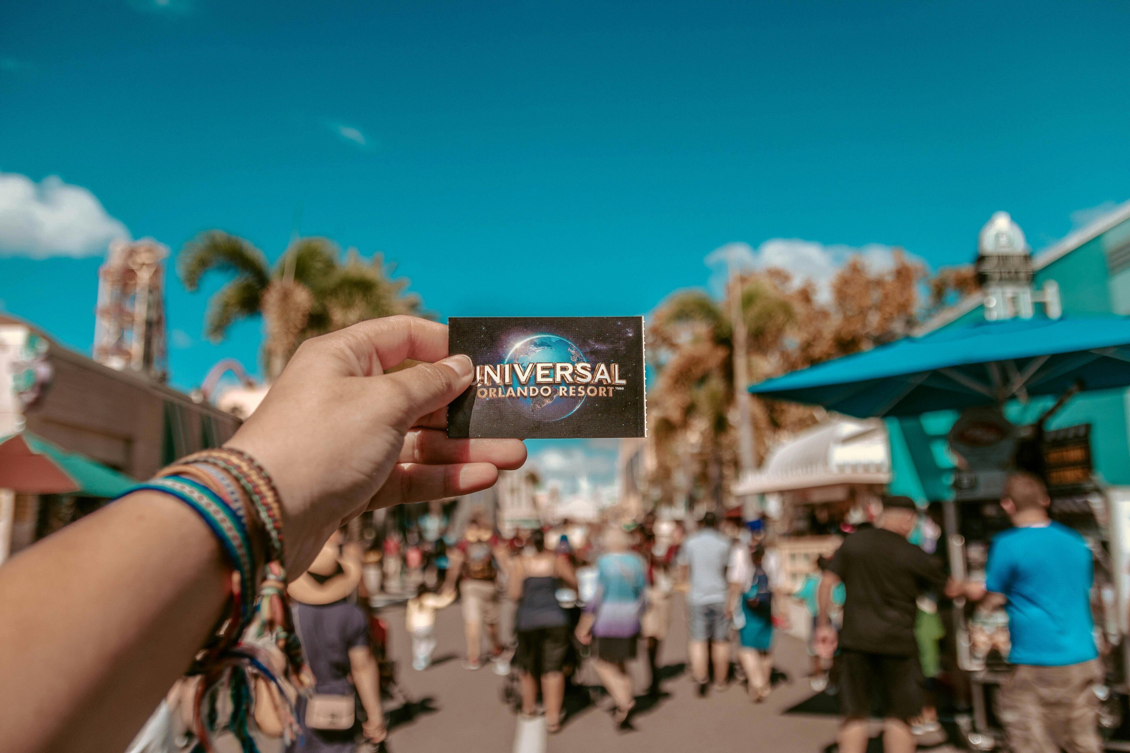 A hand holding a Universal Orlando Resort card.