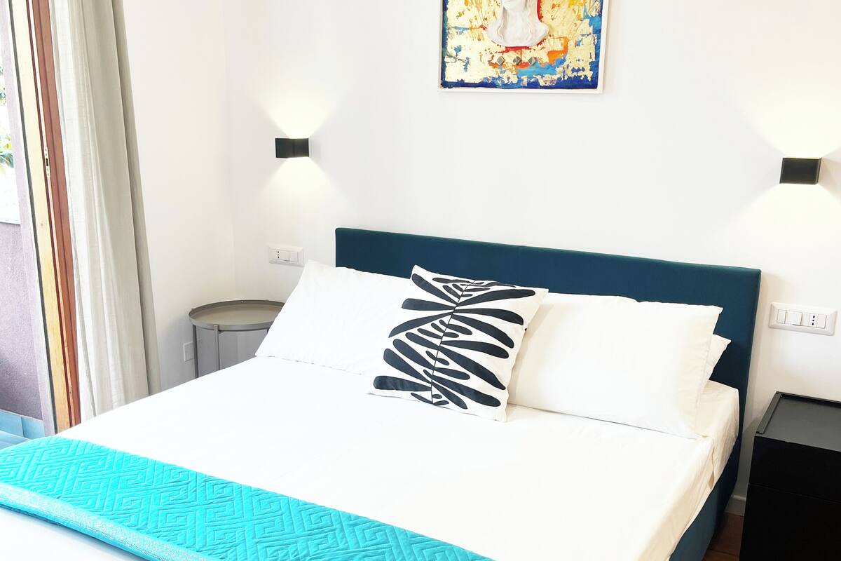 Egyptian cotton sheets, premium bedding, laptop workspace
