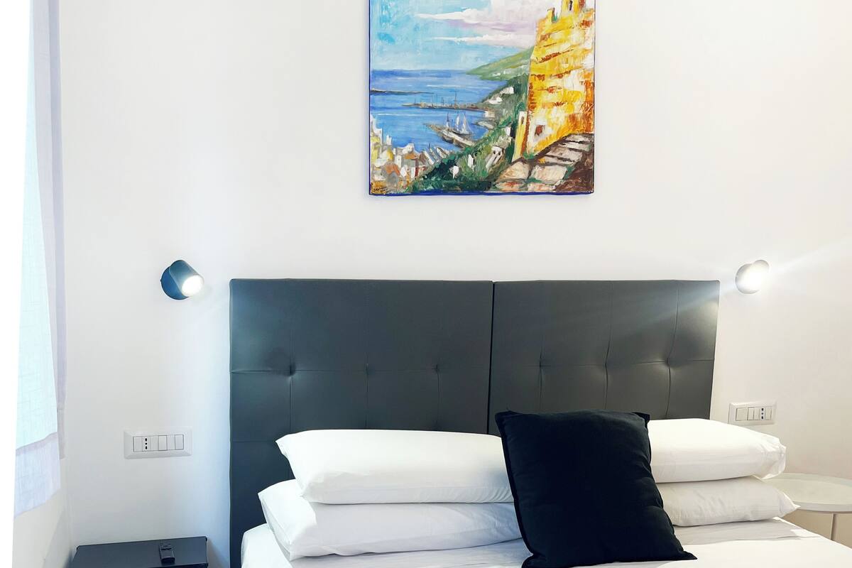 Egyptian cotton sheets, premium bedding, laptop workspace