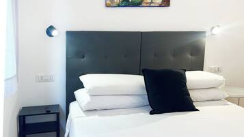 Egyptian cotton sheets, premium bedding, laptop workspace