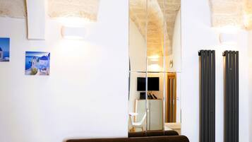 Comfort House, City View | Living area | Flat-screen TV