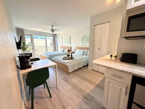 Iron/ironing board, travel cot, WiFi, bed sheets - Sunny Beachfront Studio Steps from the Beach (Daytona Beach)